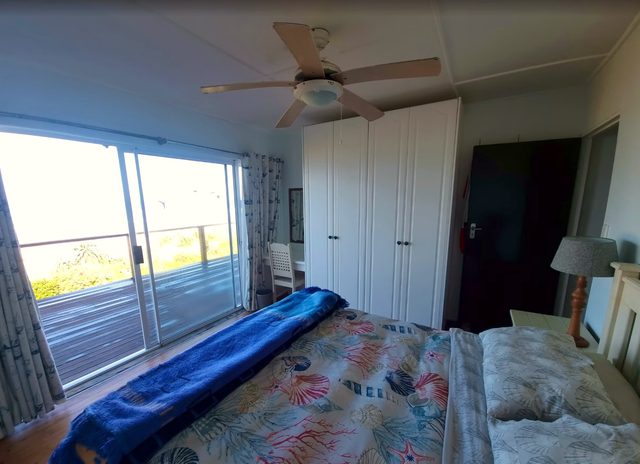 Main bedroom with deck access